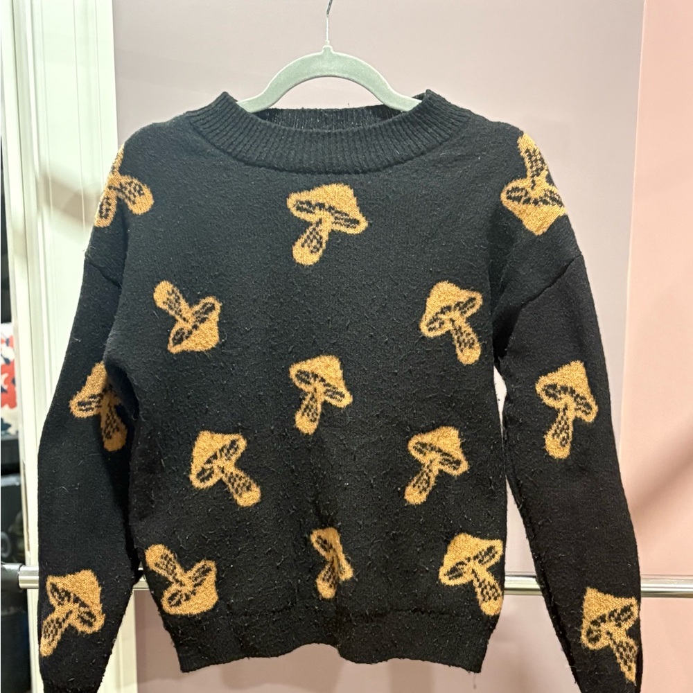 No Boundaries Black and Gold Sweater with Mushroom Design